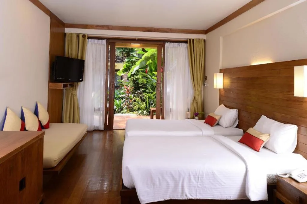 Bed in Baan Talay Dao Resort