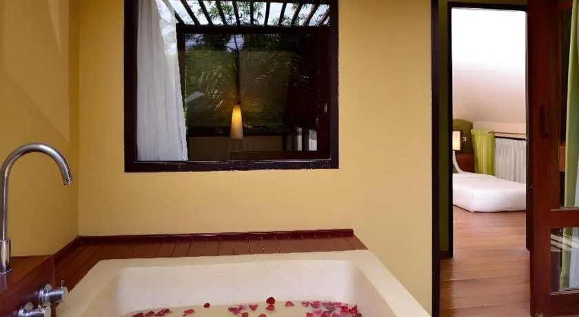 Bed in Baan Talay Dao Resort