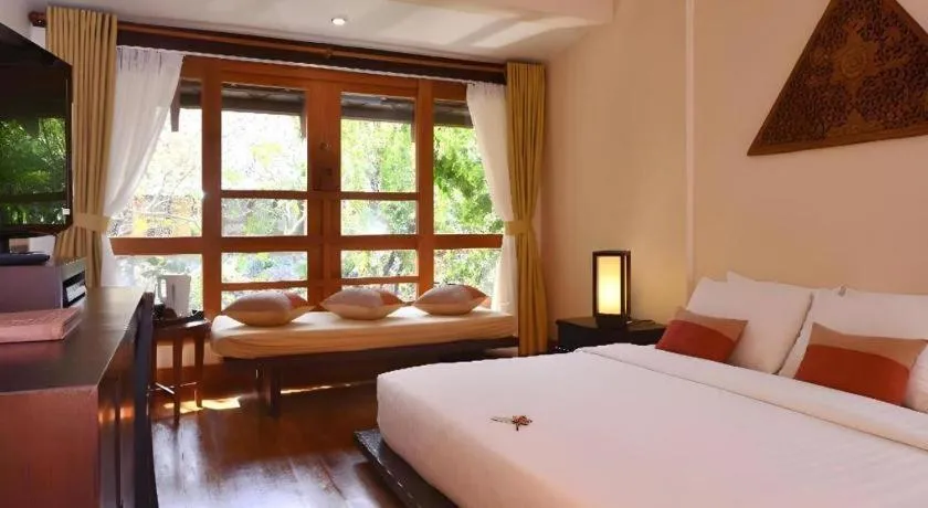 Bed in Baan Talay Dao Resort