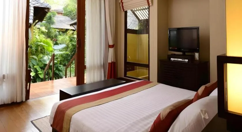 Bed in Baan Talay Dao Resort