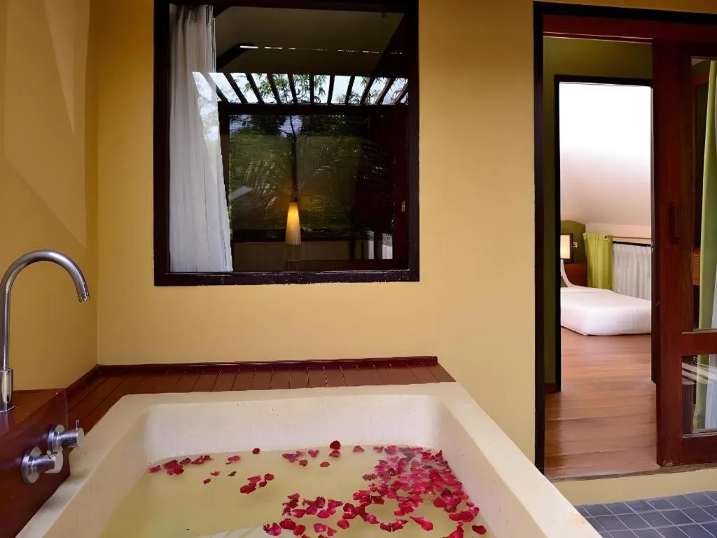 Bed in Baan Talay Dao Resort