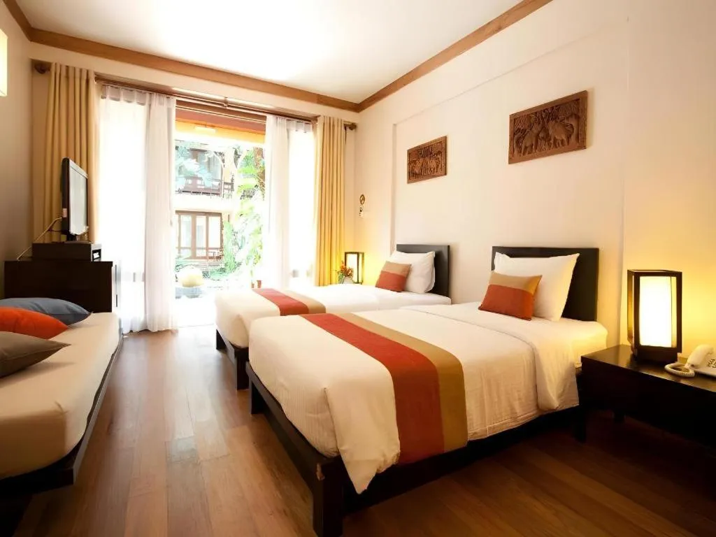 Bed in Baan Talay Dao Resort