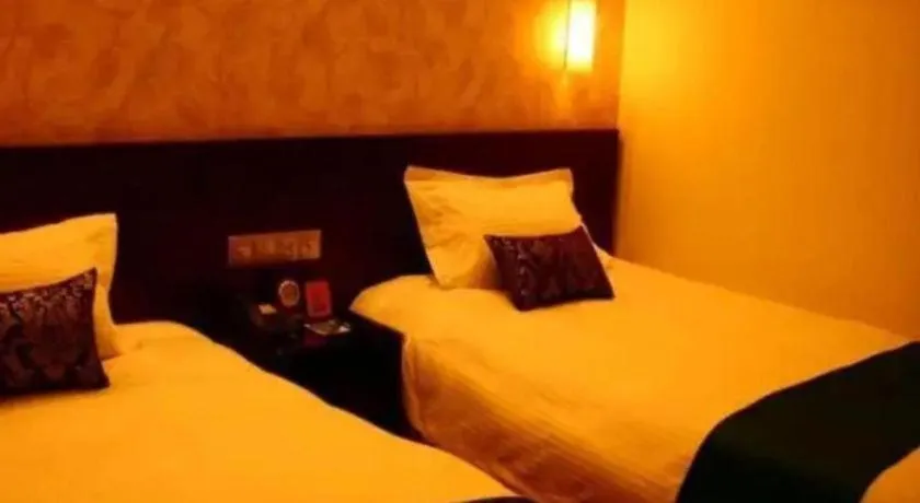 Bed in NanYing Hotel Shanghai