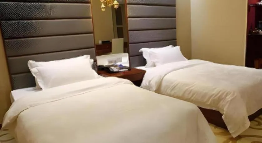 Bed in Milu Hotel