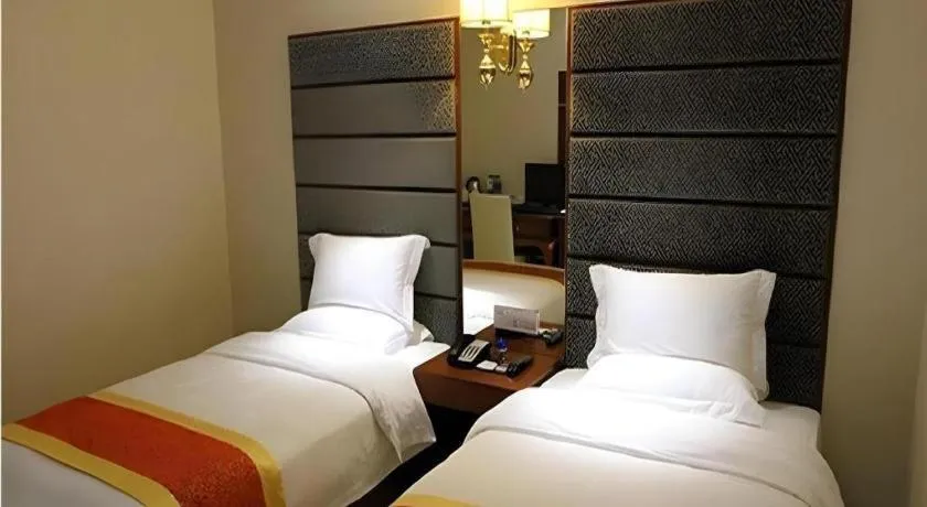 Bed in Milu Hotel