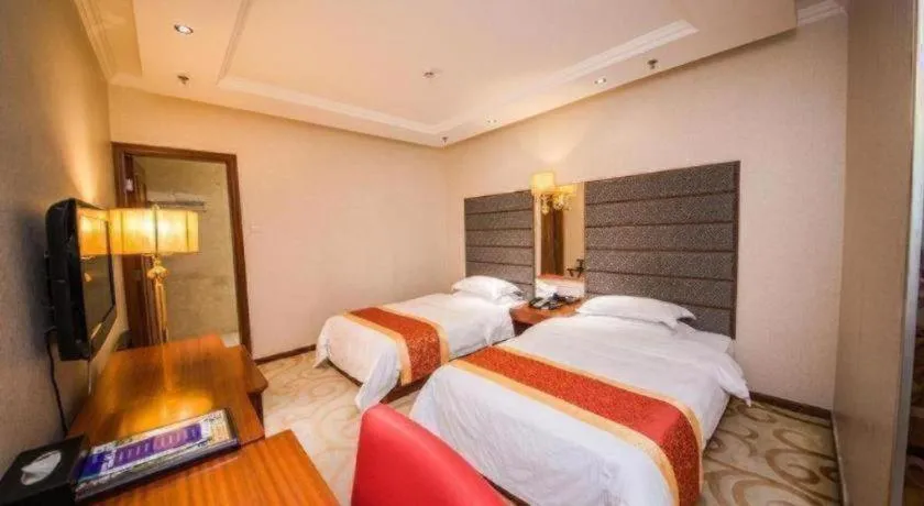 Bed in Milu Hotel