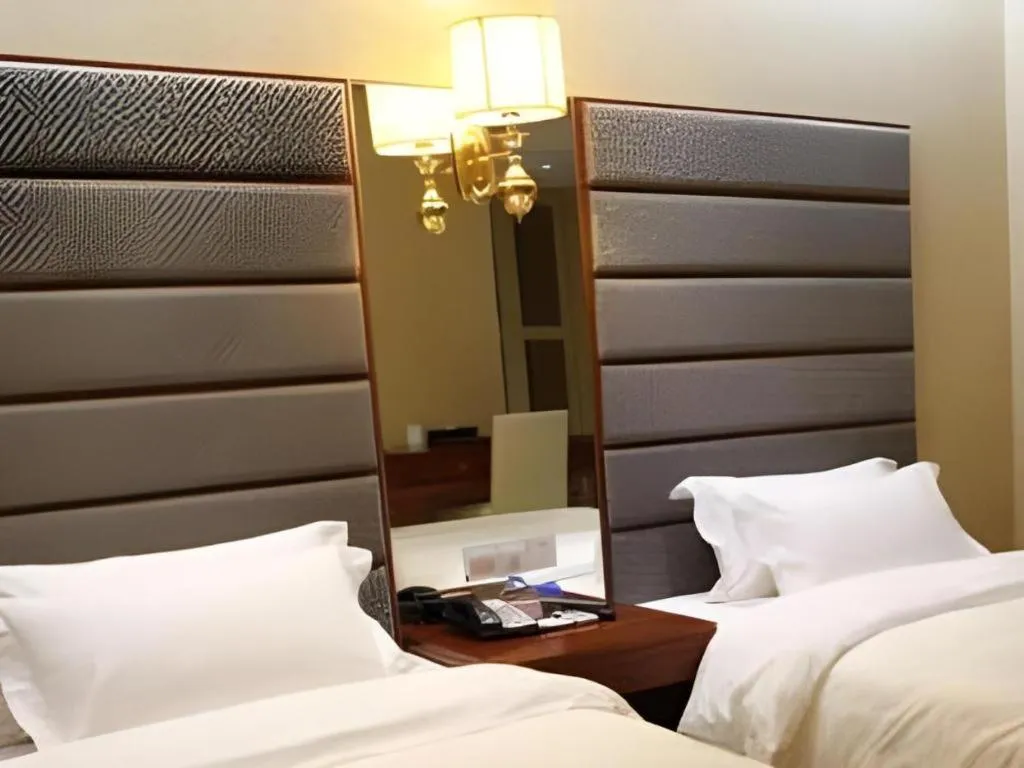Bed in Milu Hotel