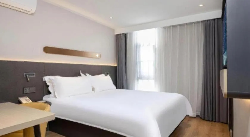 Bed in Jinjiang Inn Shenzhen Airport