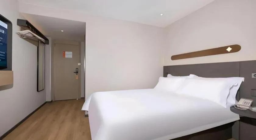 Bed in Jinjiang Inn Shenzhen Airport