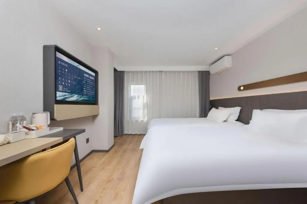 Bed in Jinjiang Inn Shenzhen Airport