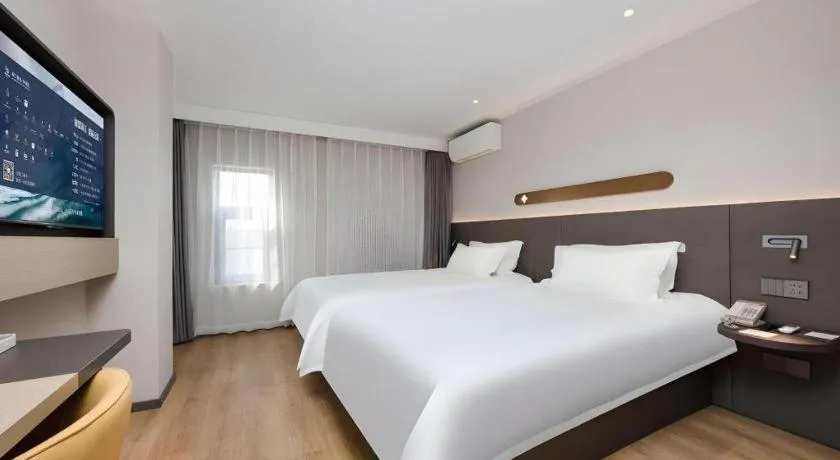 Bed in Jinjiang Inn Shenzhen Airport