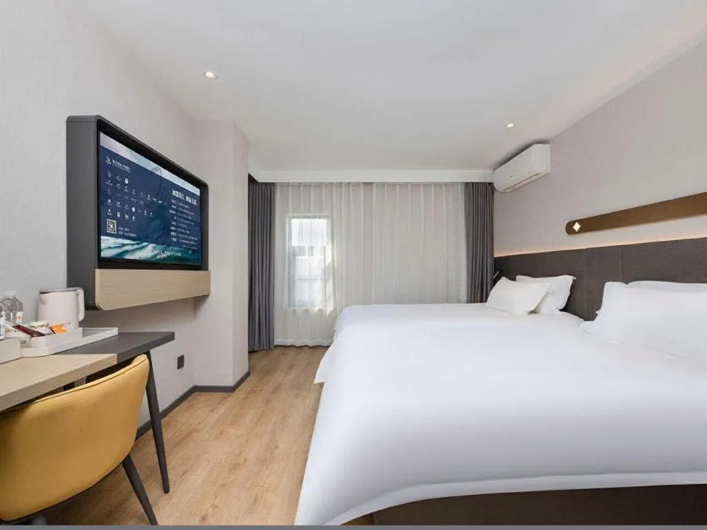 Bed in Jinjiang Inn Shenzhen Airport