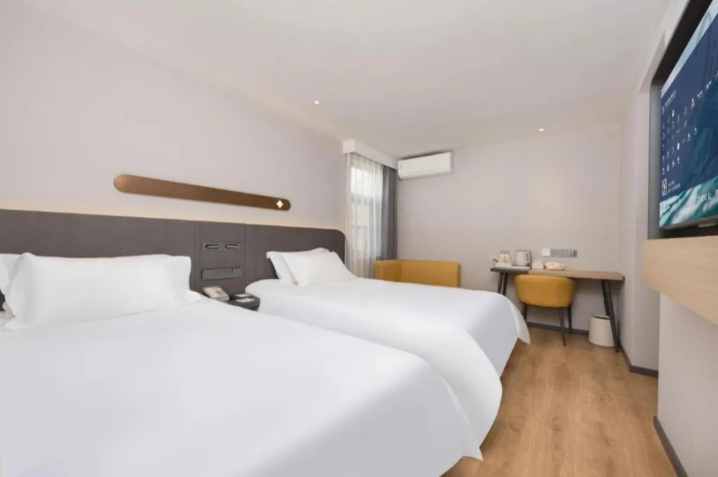 Bed in Jinjiang Inn Shenzhen Airport