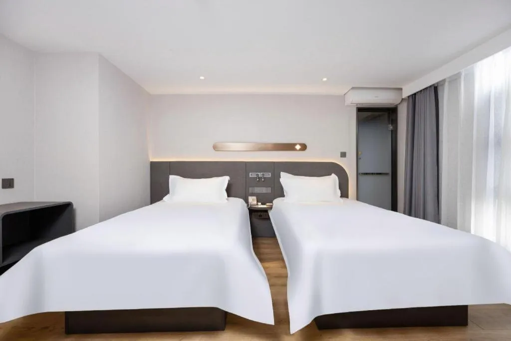 Bed in Jinjiang Inn Shenzhen Airport