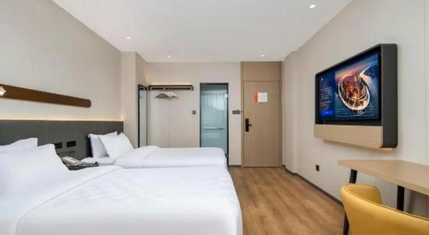 Bed in Jinjiang Inn Zhuhai Xiangzhou Qinglv Middle Road Theater