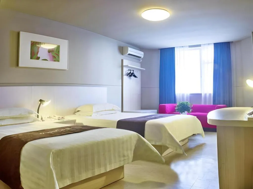 Bed in Jinjiang Inn Zhuhai Xiangzhou Qinglv Middle Road Theater