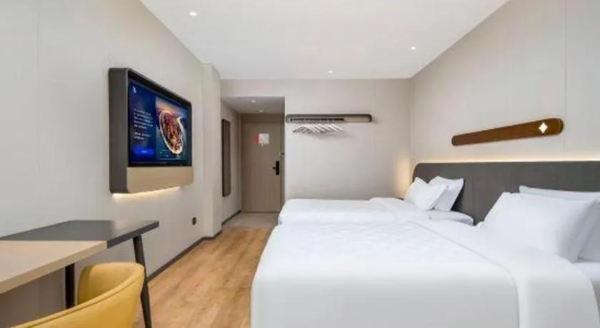 Bed in Jinjiang Inn Zhuhai Xiangzhou Qinglv Middle Road Theater