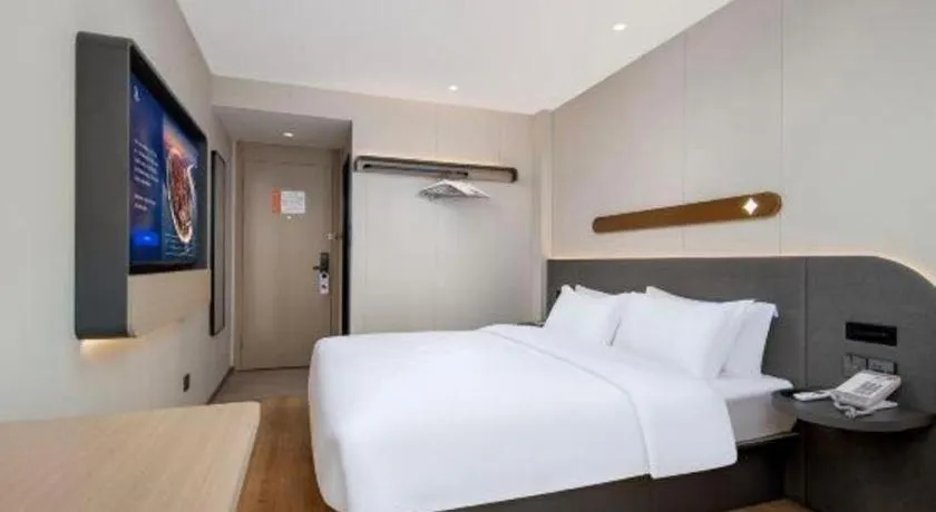 Bed in Jinjiang Inn Zhuhai Xiangzhou Qinglv Middle Road Theater