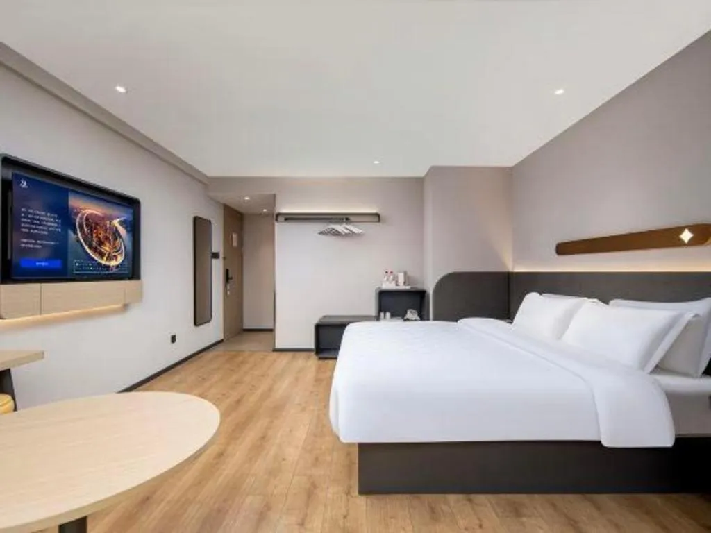 Bed in Jinjiang Inn Zhuhai Xiangzhou Qinglv Middle Road Theater