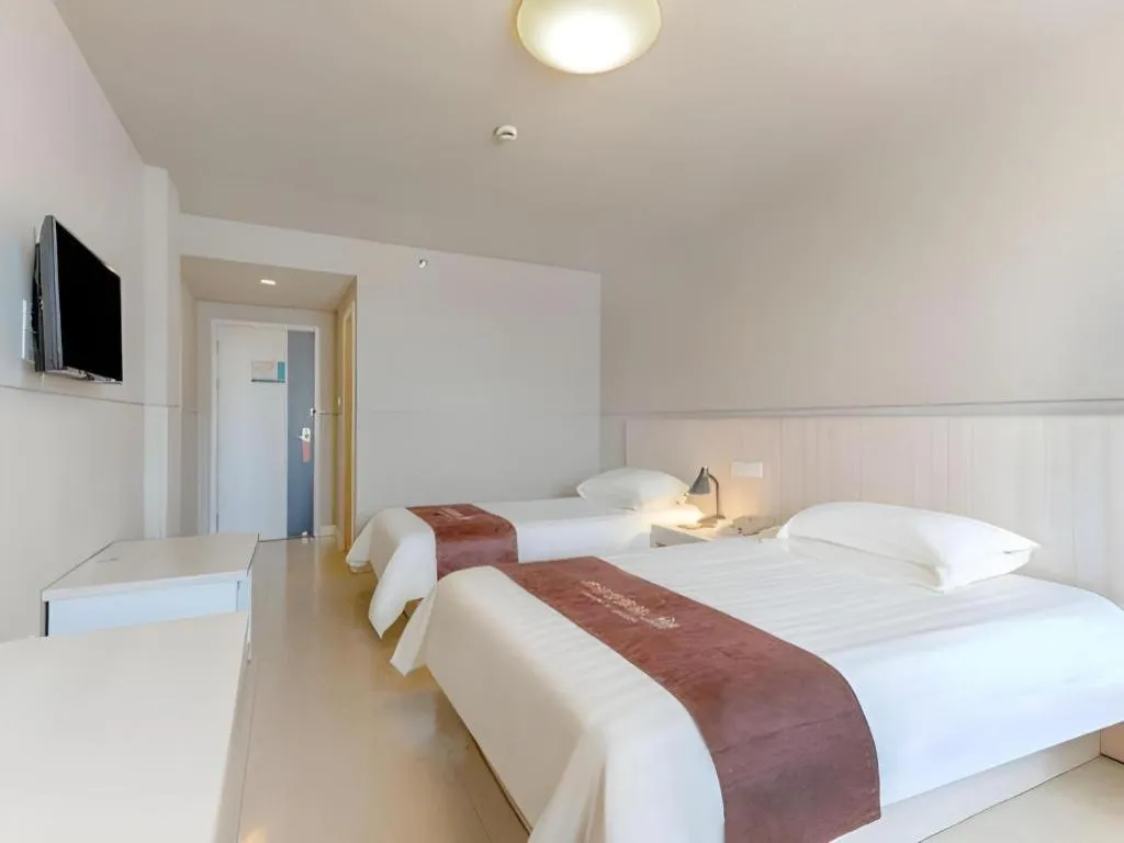 Bed in Jinjiang Inn Zhuhai Xiangzhou Qinglv Middle Road Theater