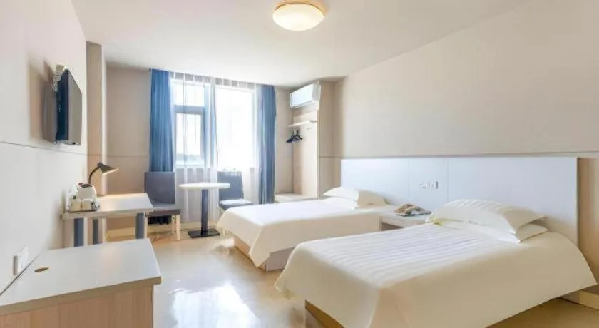 Bed in Jinjiang Inn Zhuhai Xiangzhou Qinglv Middle Road Theater