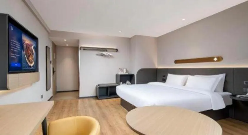 Bed in Jinjiang Inn Zhuhai Xiangzhou Qinglv Middle Road Theater