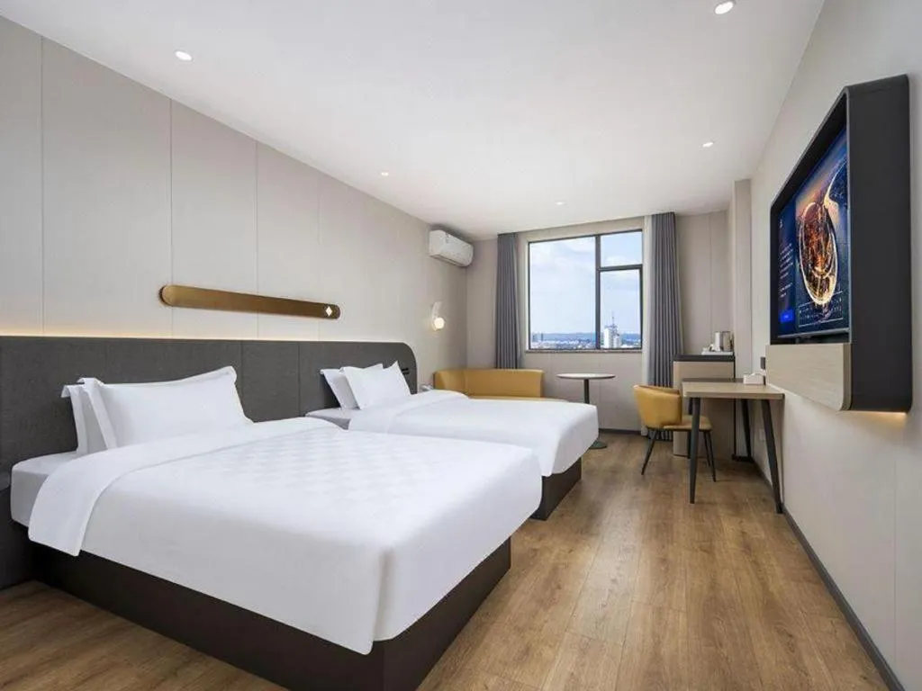 Bed in Jinjiang Inn Zhuhai Xiangzhou Qinglv Middle Road Theater