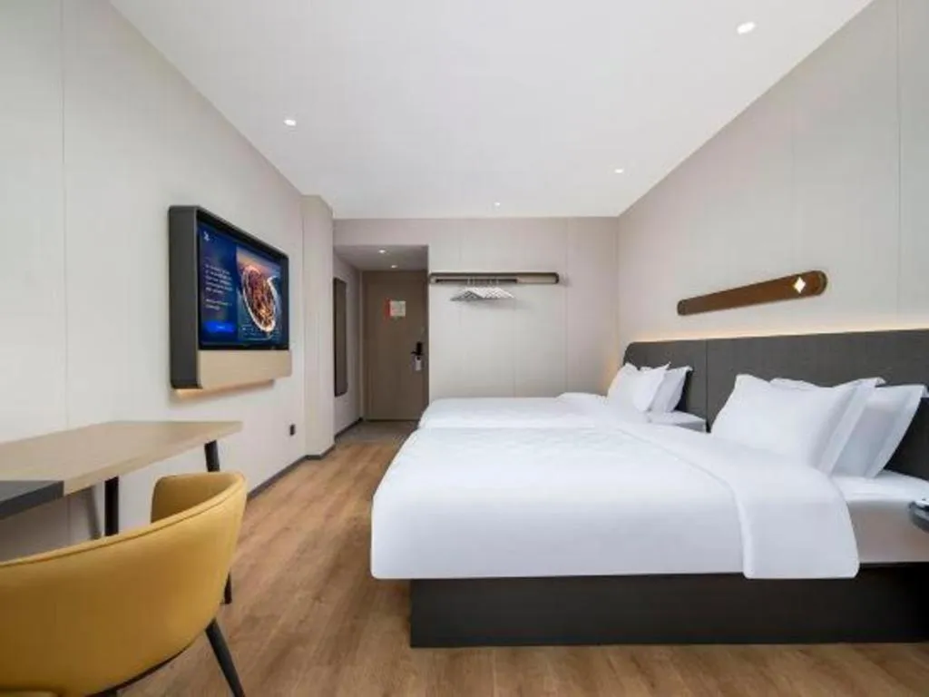 Bed in Jinjiang Inn Zhuhai Xiangzhou Qinglv Middle Road Theater