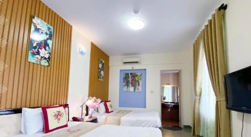 Bed in Ideal Hotel Hue