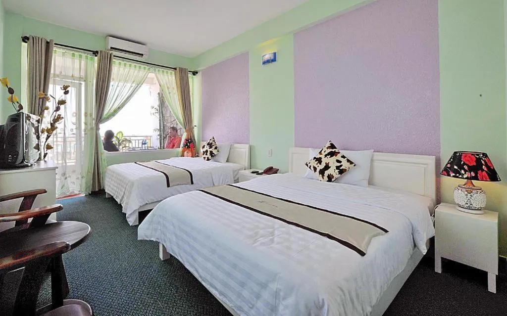 Bed in Ideal Hotel Hue