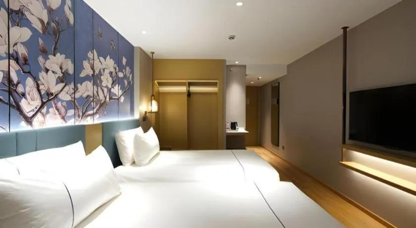 Bed in Jinjiang Inn Shanghai Lujiazui