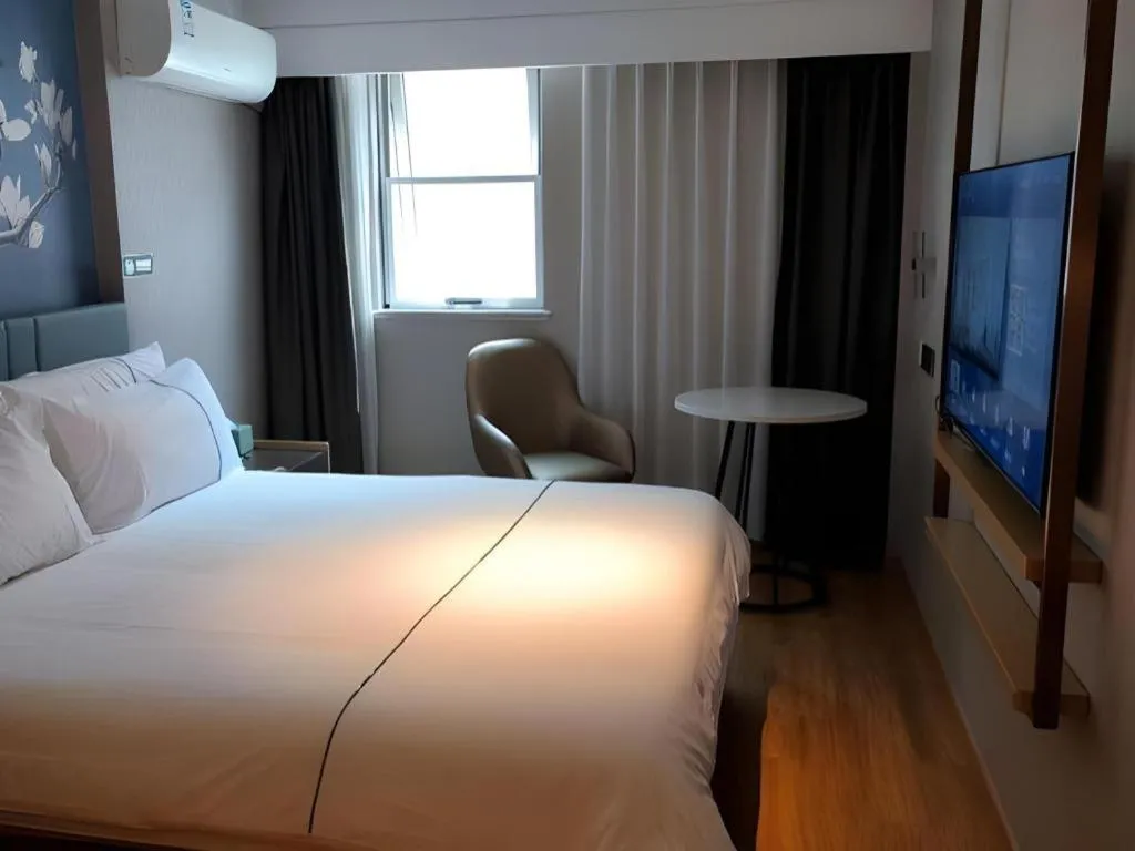 Bed in Jinjiang Inn Shanghai Lujiazui