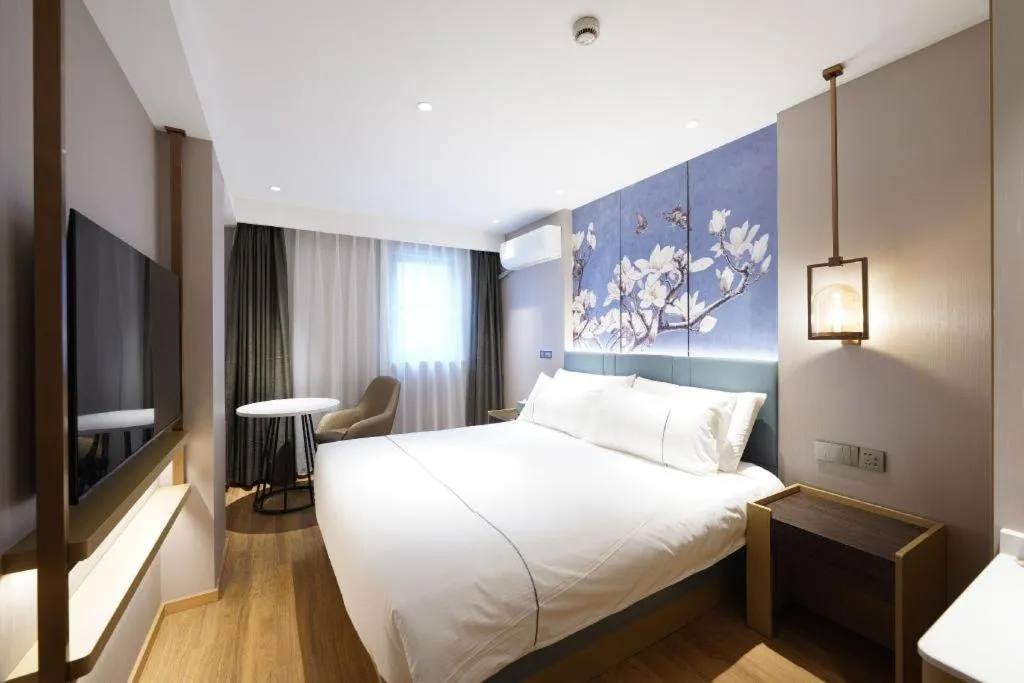 Bed in Jinjiang Inn Shanghai Lujiazui