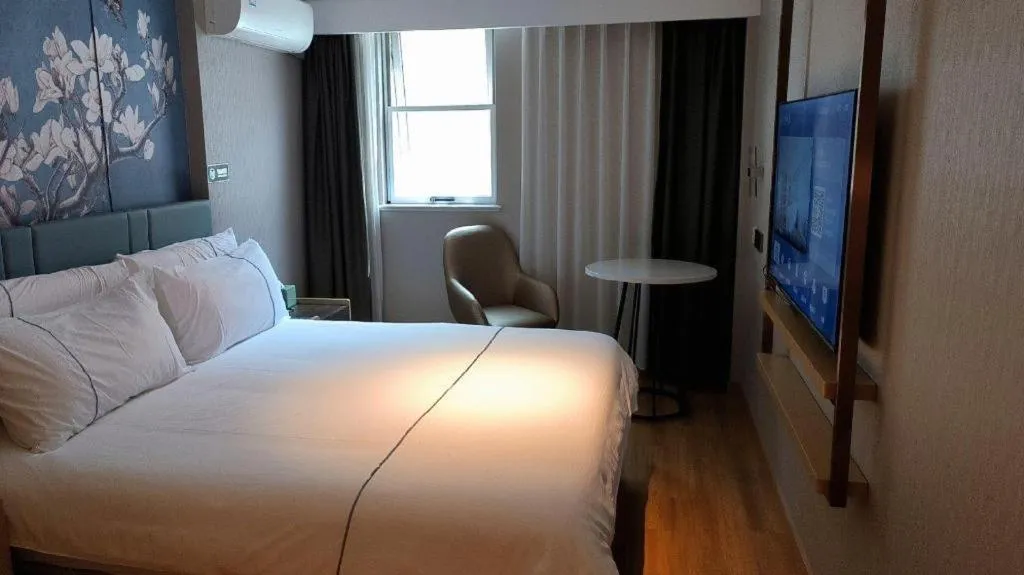 Bed in Jinjiang Inn Shanghai Lujiazui