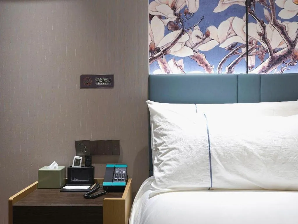 Bed in Jinjiang Inn Shanghai Lujiazui