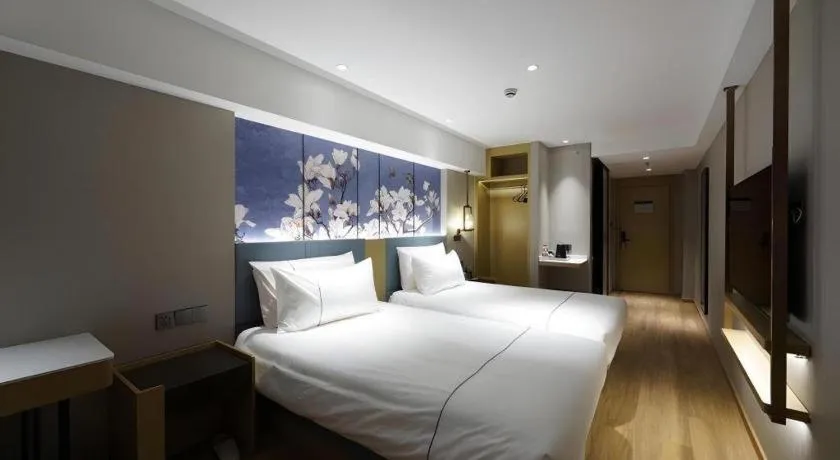 Bed in Jinjiang Inn Shanghai Lujiazui