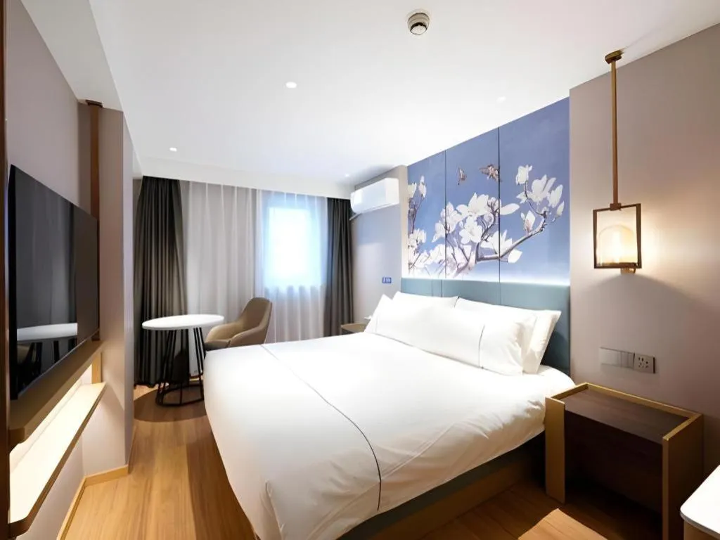 Bed in Jinjiang Inn Shanghai Lujiazui