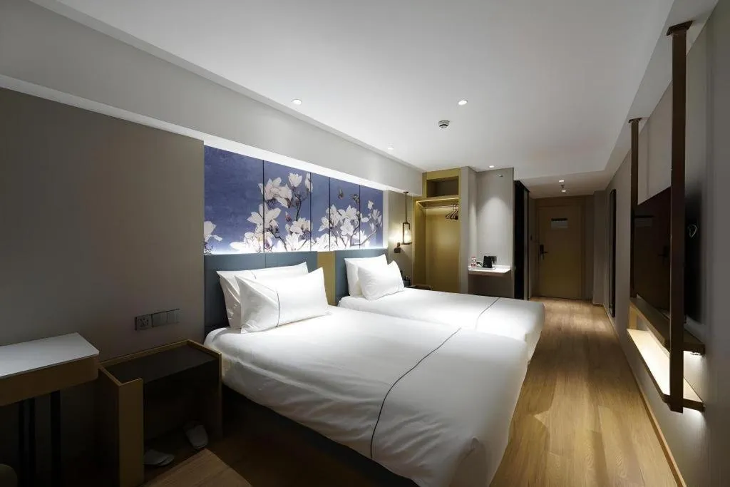 Bed in Jinjiang Inn Shanghai Lujiazui