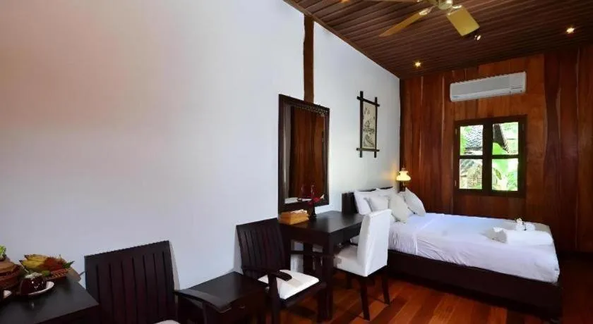 Bed in Le Bel Air Resort Luang Prabang