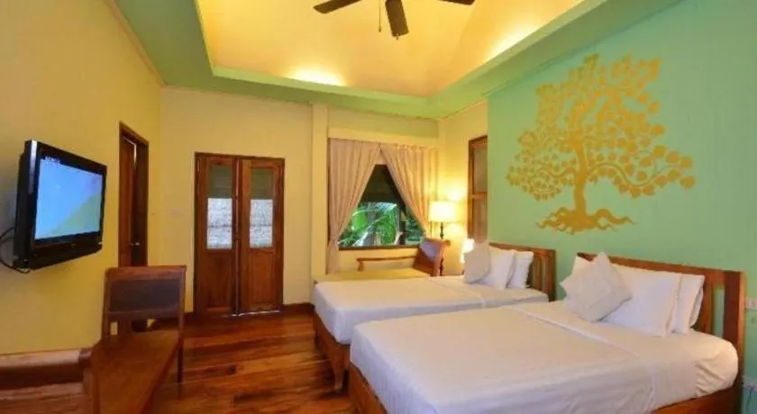 Bed in Le Bel Air Resort Luang Prabang