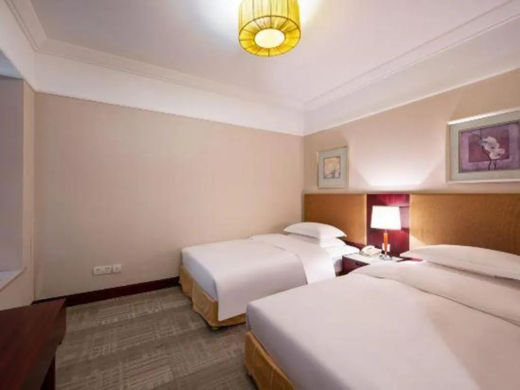Bed in Golden Diamond Hotel Zhongshan