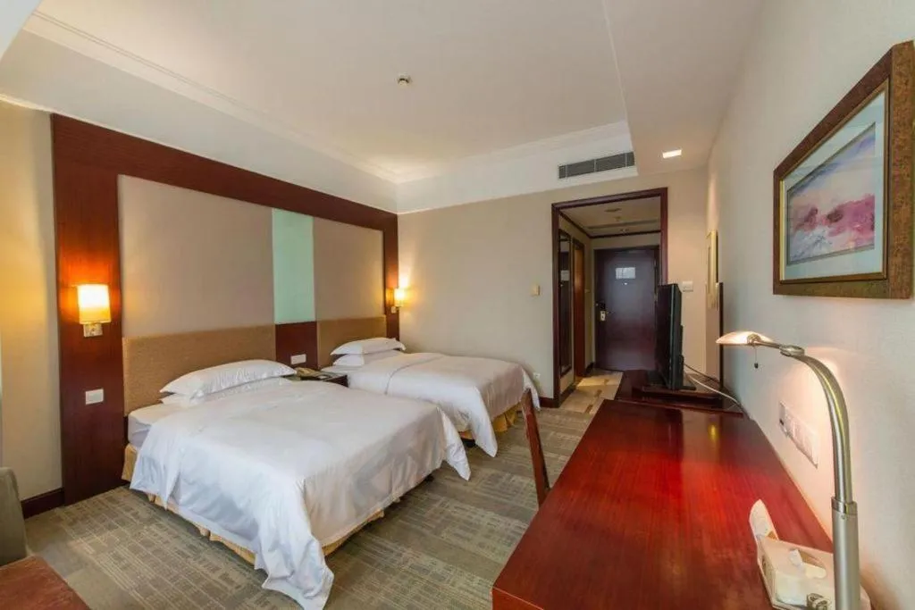 Bed in Golden Diamond Hotel Zhongshan
