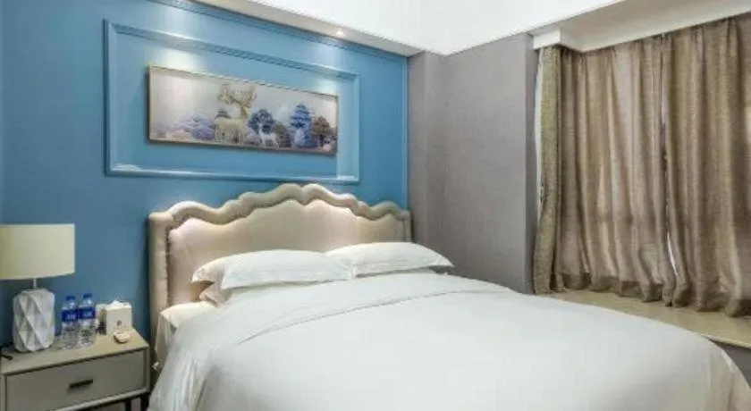 Bed in Golden Diamond Hotel Zhongshan