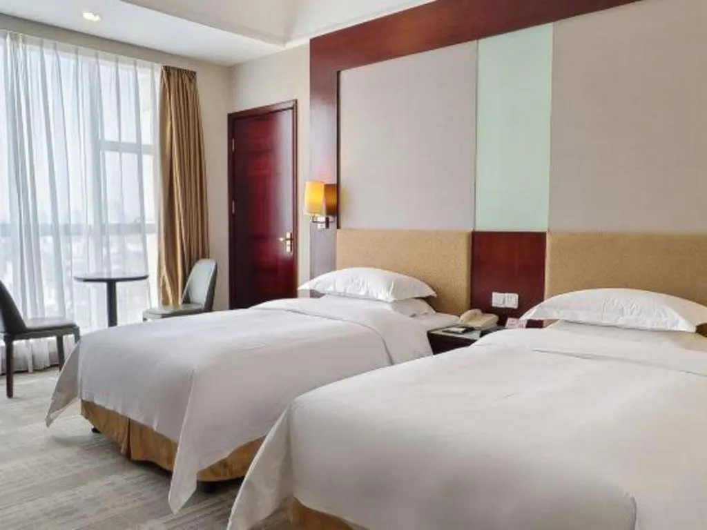 Bed in Golden Diamond Hotel Zhongshan
