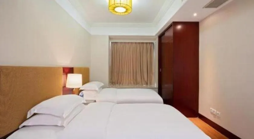 Bed in Golden Diamond Hotel Zhongshan