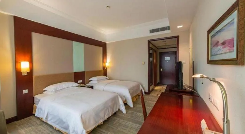 Bed in Golden Diamond Hotel Zhongshan