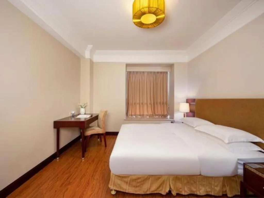 Bed in Golden Diamond Hotel Zhongshan
