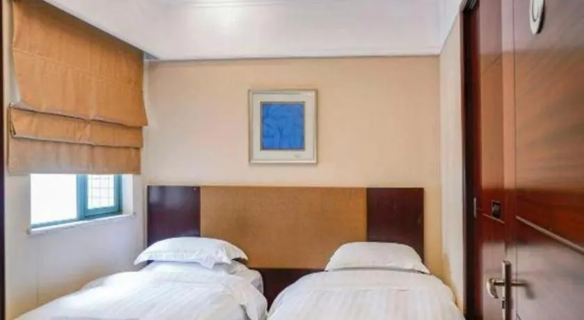 Bed in Golden Diamond Hotel Zhongshan