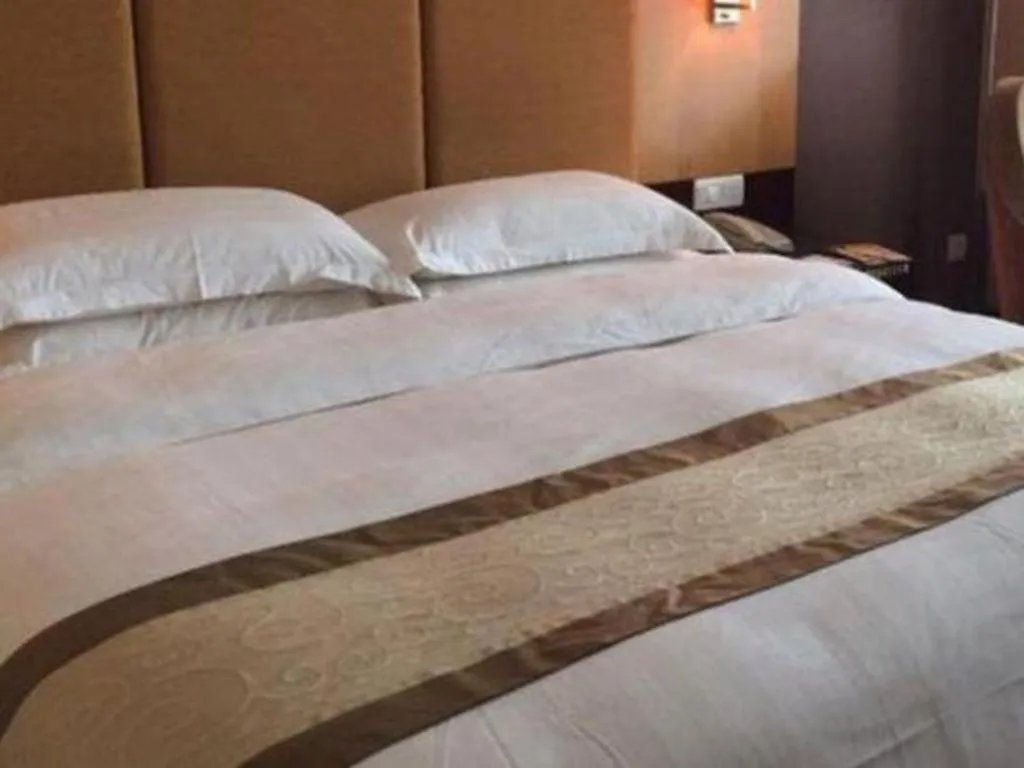 Bed in Golden Diamond Hotel Zhongshan