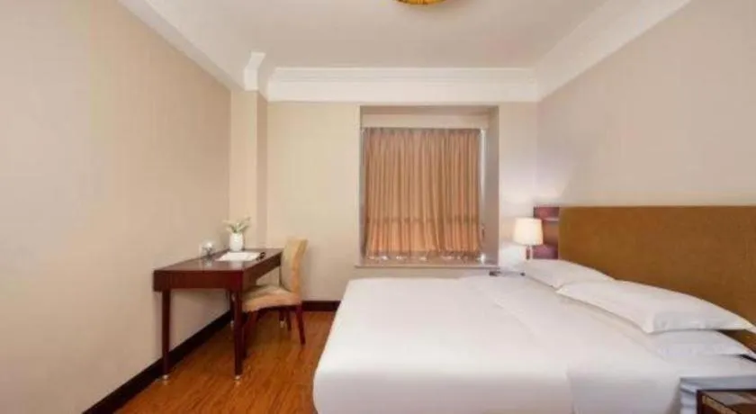Bed in Golden Diamond Hotel Zhongshan